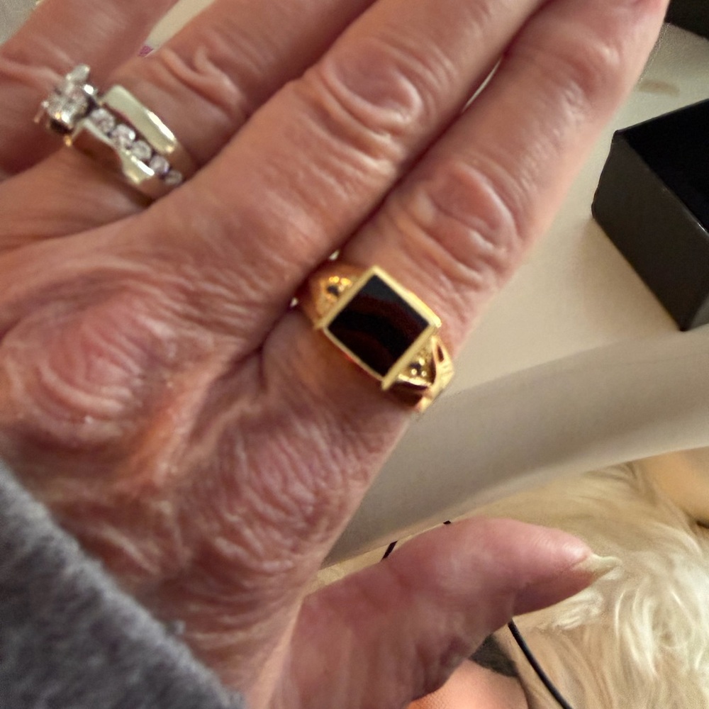 Men’s black onyx ring set in 14kt gold over sterling silver